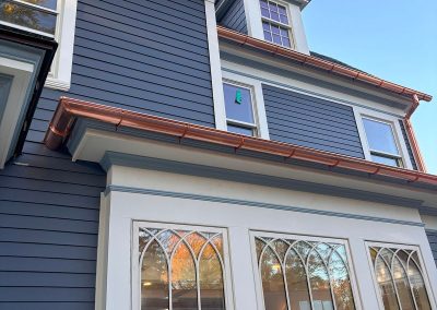 blue house with copper gutters in haddonfield nj