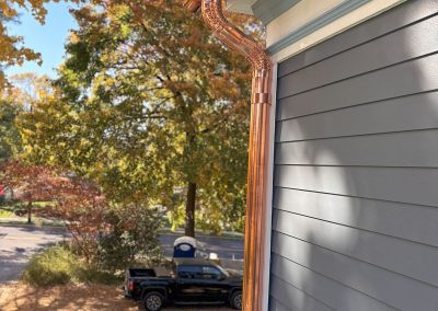blue house with copper gutters in haddonfield nj
