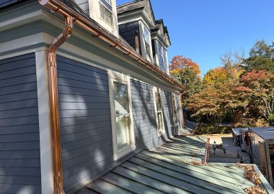 blue house with copper gutters in haddonfield nj
