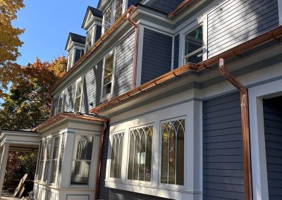 blue house with copper gutters in haddonfield nj