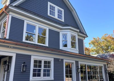 blue house with copper gutters in haddonfield nj