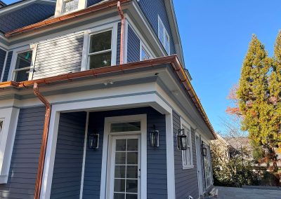 blue house with copper gutters in haddonfield nj