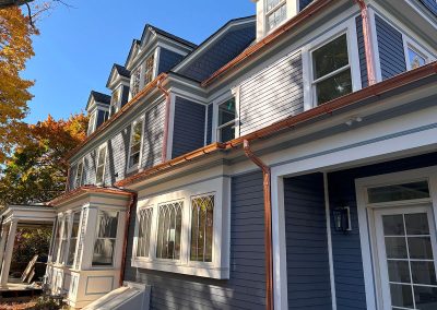 blue house with copper gutters in haddonfield nj