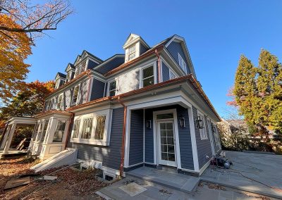 blue house with copper gutters in haddonfield nj