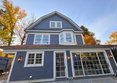blue house with copper gutters in haddonfield nj
