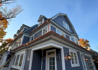 blue house with copper gutters in haddonfield nj