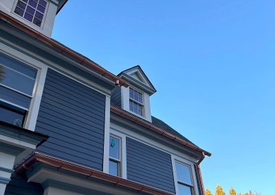 blue house with copper gutters in haddonfield nj