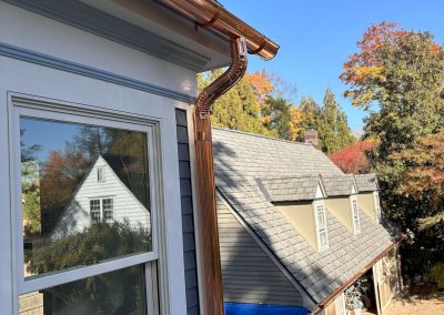blue house with copper gutters in haddonfield nj