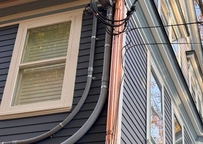 blue house with copper gutters in haddonfield nj