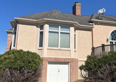rear view of house with new white gutters in shamong nj van's rain gutters south jersey