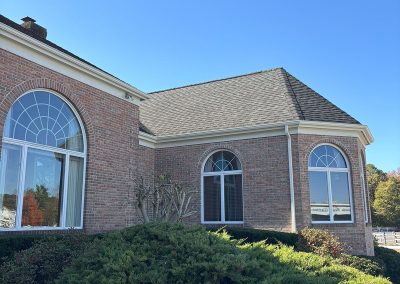 side view of house with installed white gutters and downspouts shamong nj van's rain gutters south jersey